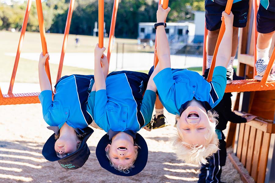 Prep students having fun on play equipment